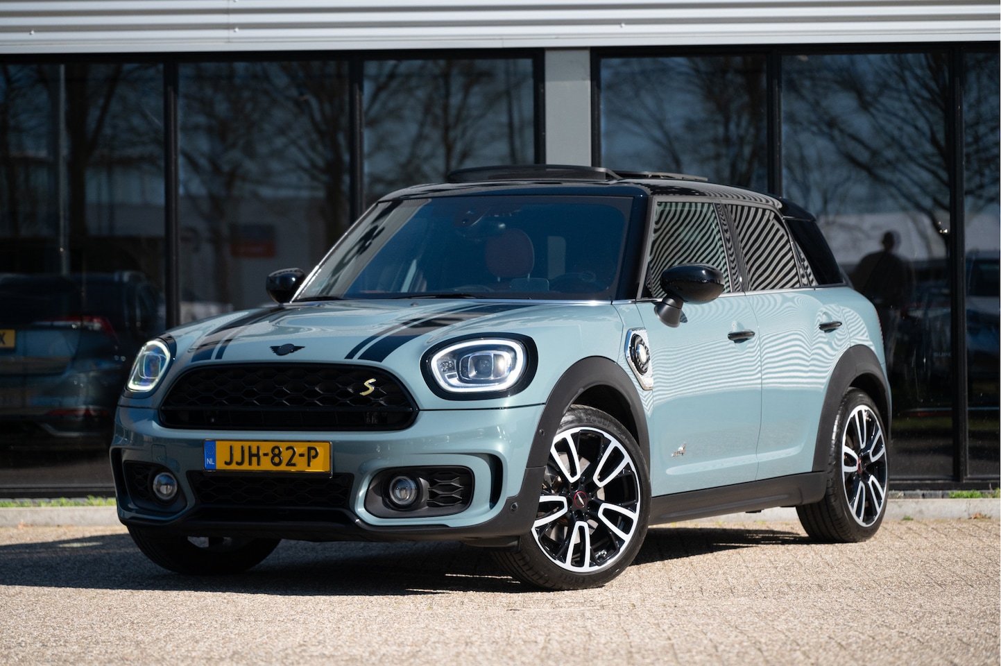 MINI Countryman - Mini 1.5 Cooper S E ALL4 JCW | Pano | HUD | Leder | Memory - AutoWereld.nl