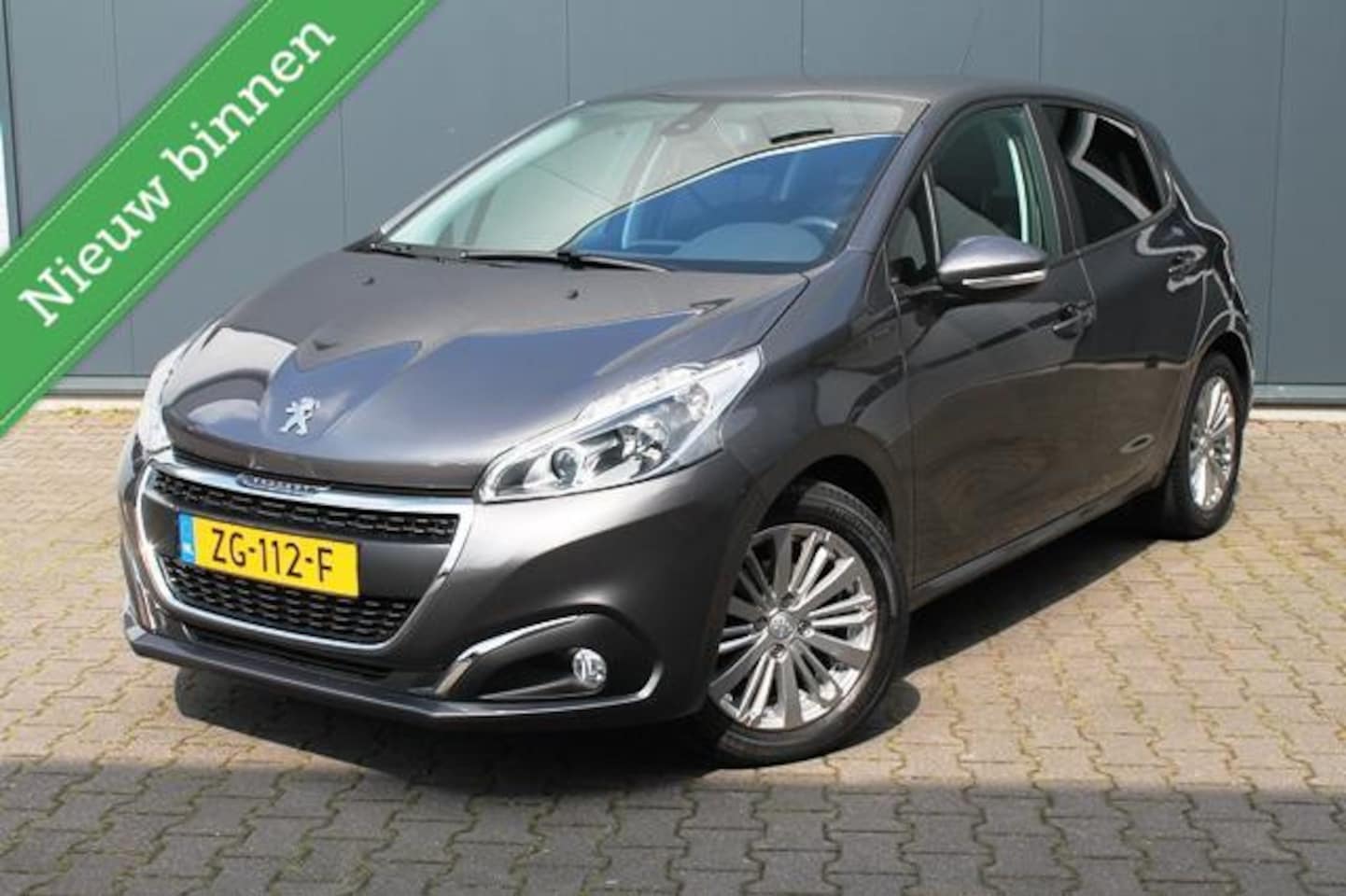 Peugeot 208 - 1.2 PureTech Signature | Navi | Automaat | Airco - AutoWereld.nl
