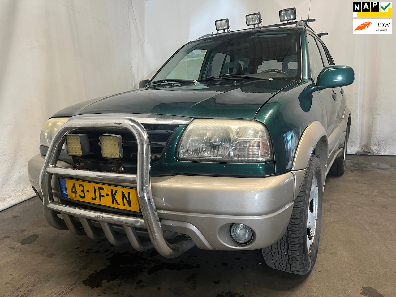 Suzuki Grand Vitara - 2.0 - Rondom Gebruikersschade - AutoWereld.nl