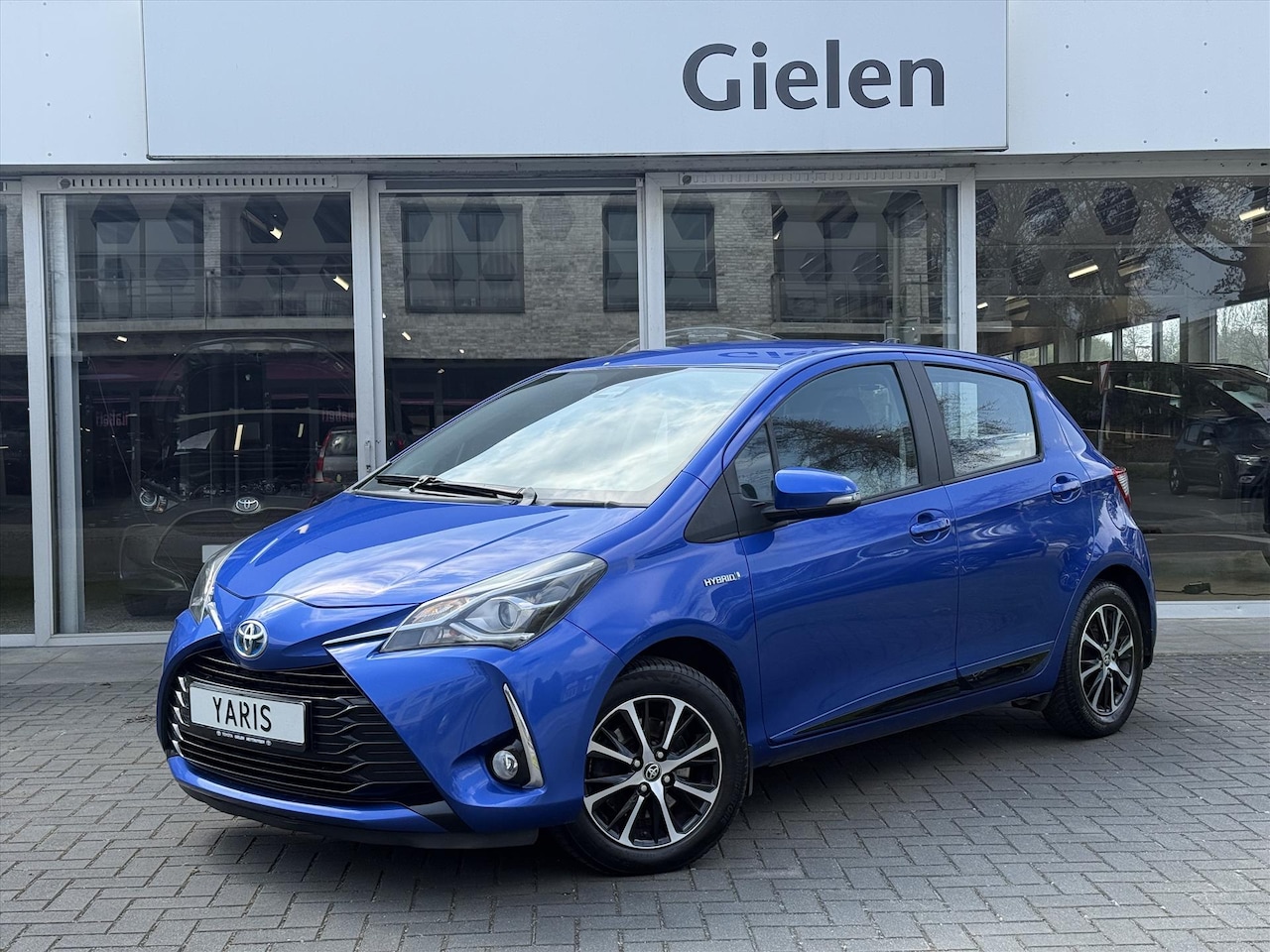 Toyota Yaris - 1.5 Full HybridDynamic | Lichtmetalen velgen, Parkeercamera, Licht + Regensensor, Cruise c - AutoWereld.nl