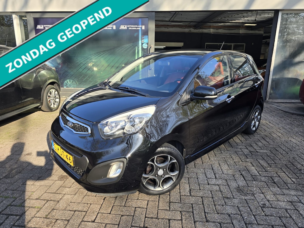Kia Picanto - 1.0 CVVT ISG Design Edition | 1E EIGENAAR | 12MND GARANTIE | LEDER | AIRCO | LMV | - AutoWereld.nl