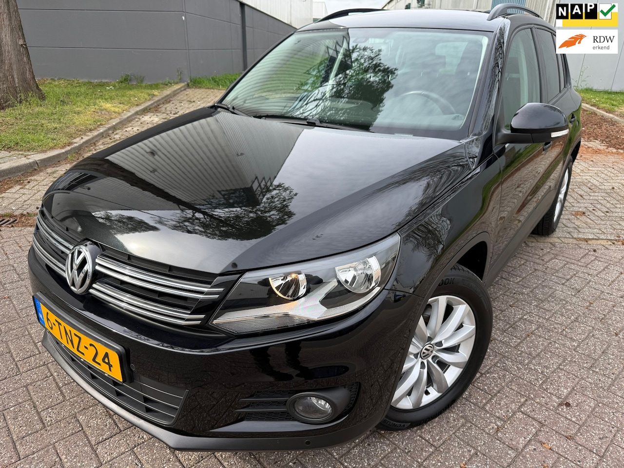 Volkswagen Tiguan - 1.4 TSI Comfort&Design Edition*PARK SENSOREN*NAVI*CRUISE*AIRCO - AutoWereld.nl