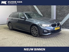 BMW 3-serie Touring - 330i High Executive | M-Sport | Panoramadak | Stoelverwarming | PDC V+A | 18 Inch