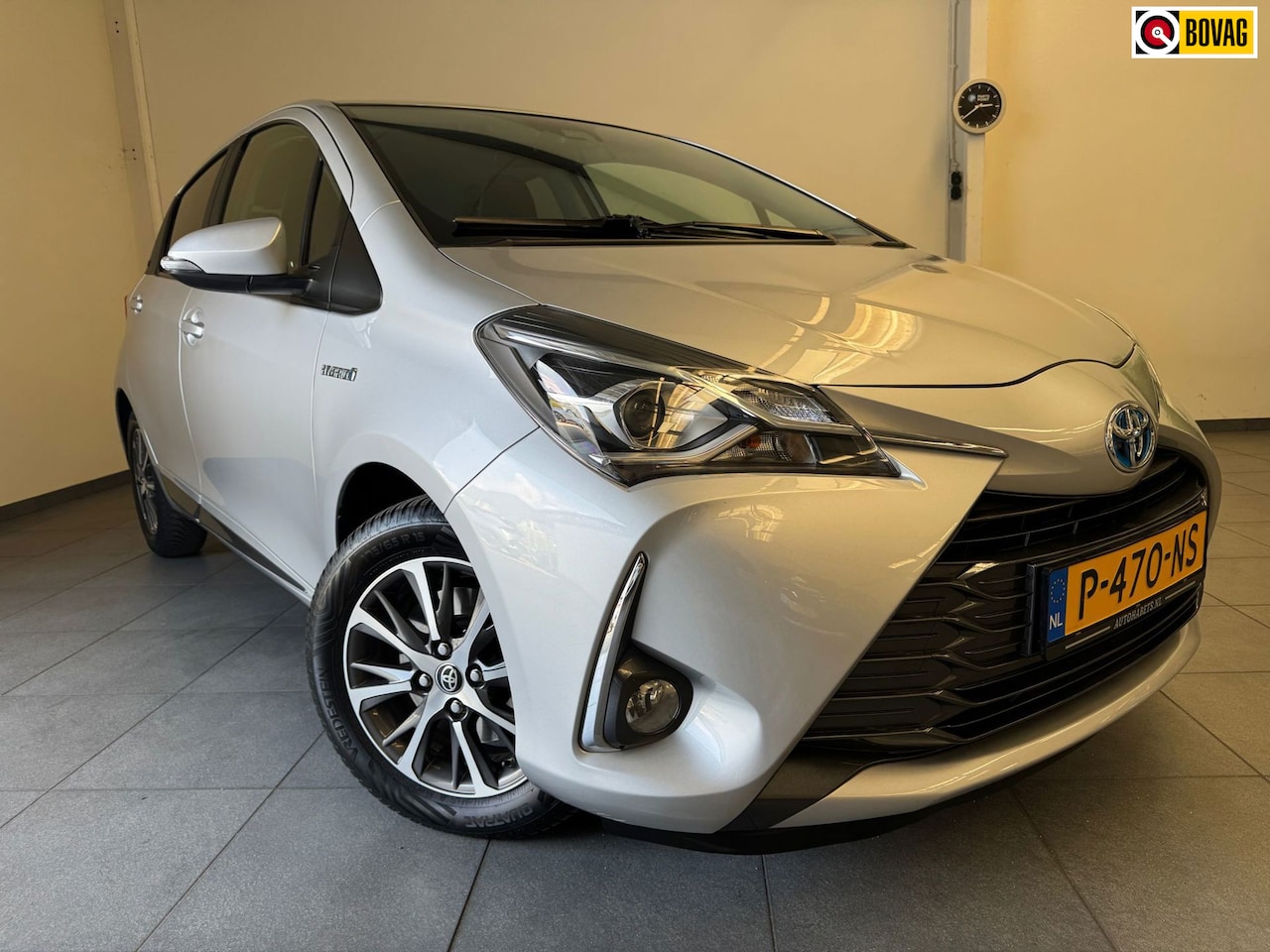 Toyota Yaris - 1.5 Hybrid Y20 Automaat/stoelverw/navi/cruise - AutoWereld.nl