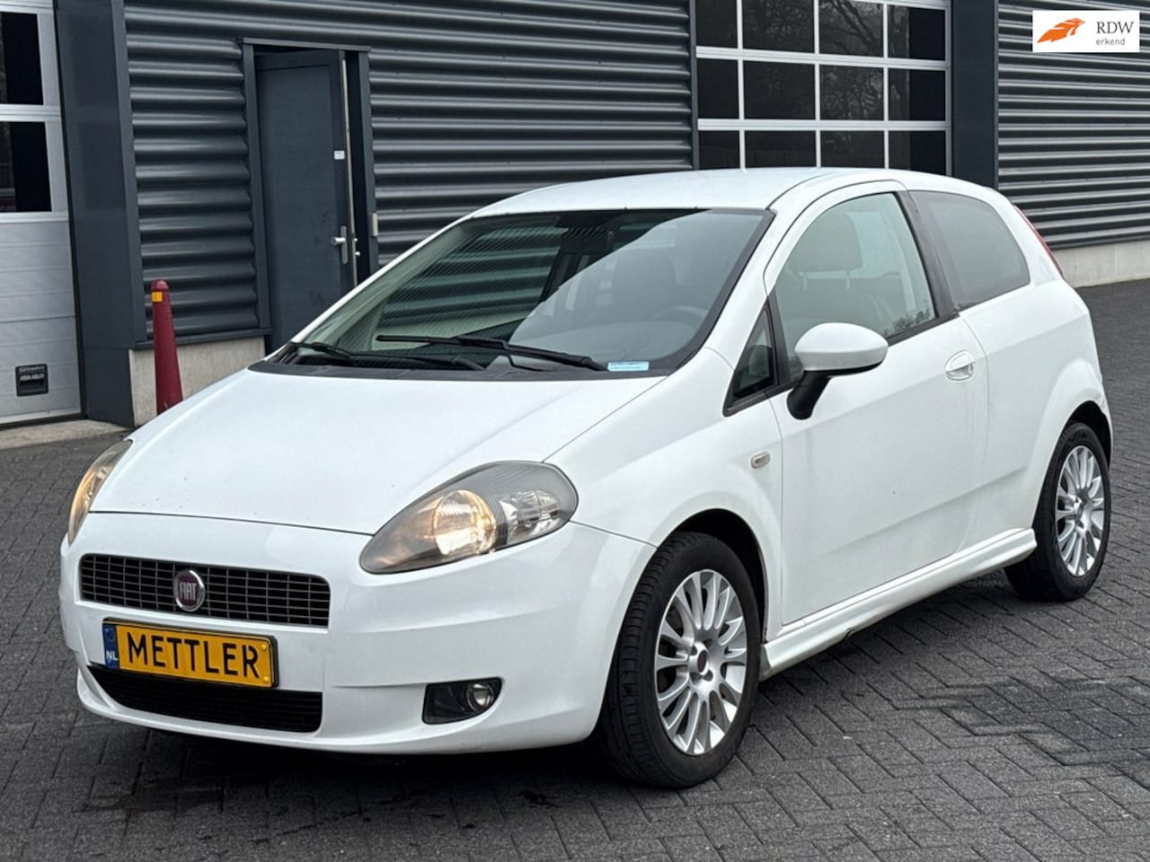 Fiat Grande Punto - 1.4 NeroBianco 1.4 NeroBianco, airco, cruise control - AutoWereld.nl