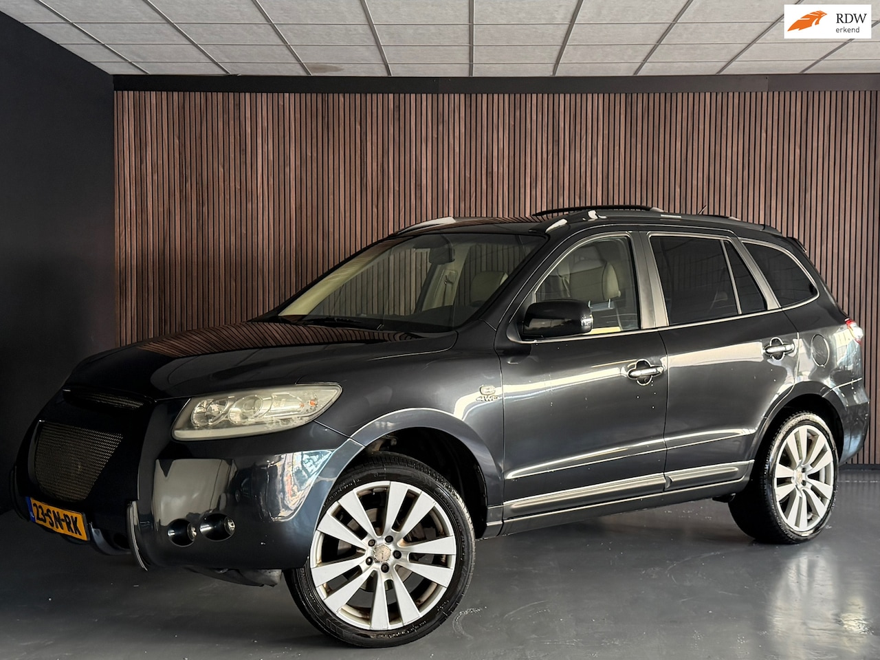 Hyundai Santa Fe - 2.7i V6 4WD Style 7 PERSOONS/AUTOMAAT/CAMERA/LEDEREN BEKLEDING/STOELVERWARMING/CARPLAY/ELE - AutoWereld.nl