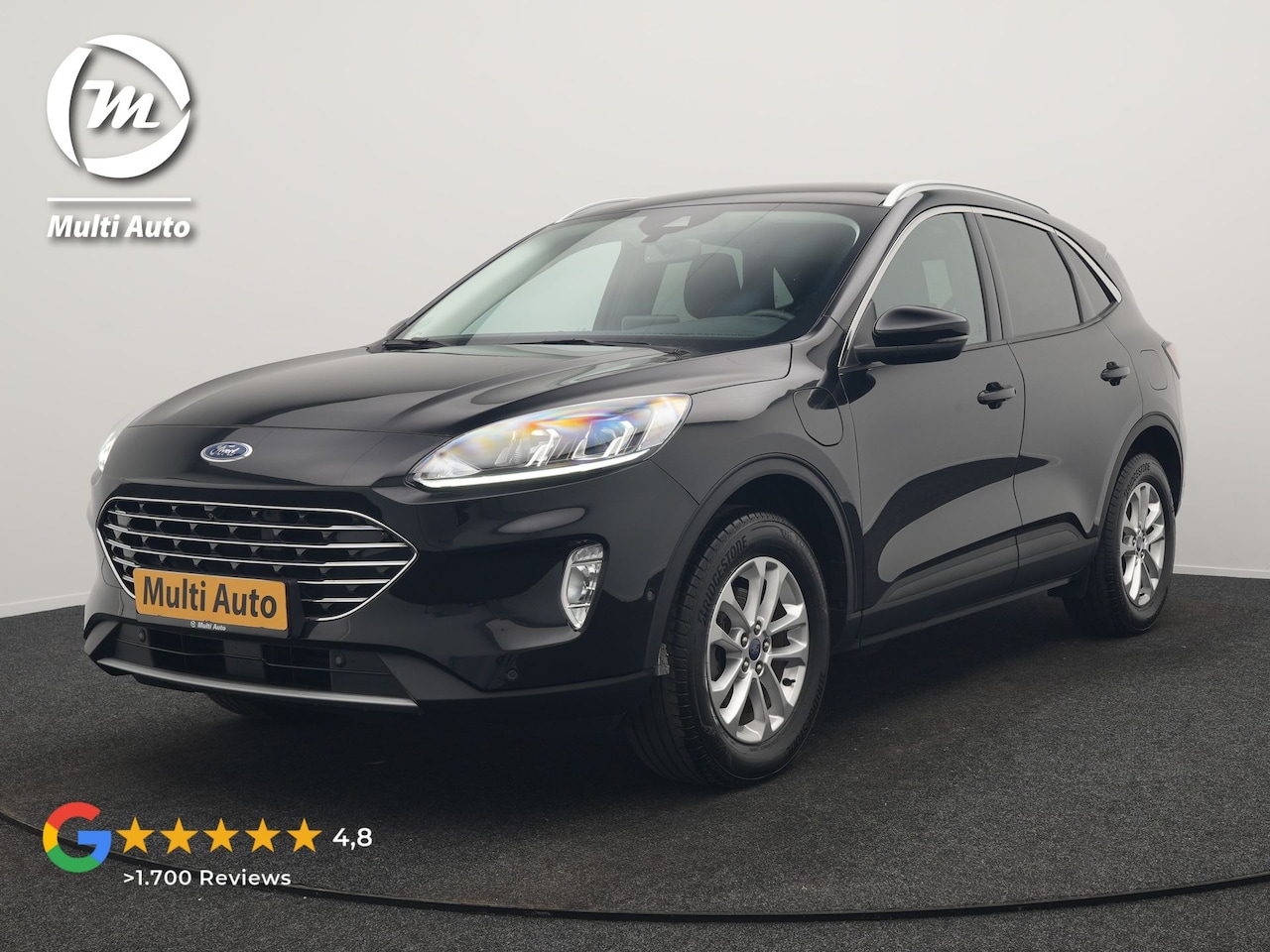 Ford Kuga - 2.5 Titanium PHEV 225pk Dealer O.H. | Adaptive Cruise | 360 Camera | Voorstoelen Verwarmd - AutoWereld.nl