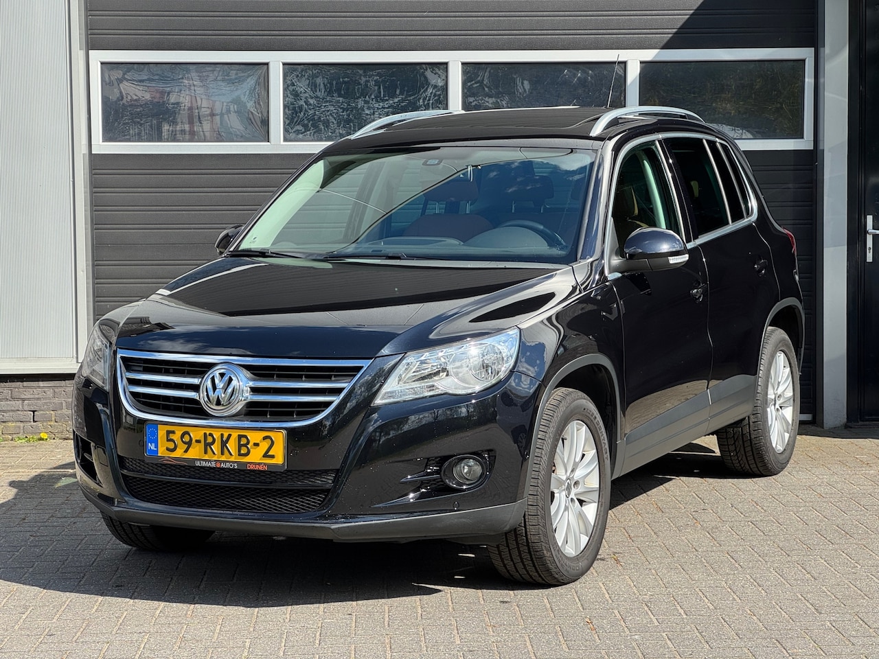 Volkswagen Tiguan - 2.0 TSI Sport&Style 4Motion Pano, Keyless, Navi, Cruise, Climate, NAP - AutoWereld.nl