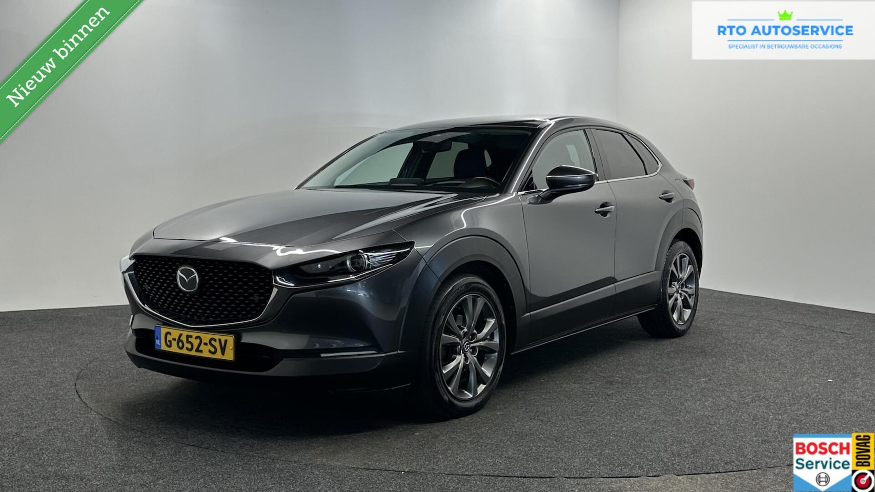 Mazda CX-30 - 2.0 e-SkyActiv-X M Hybrid Luxury LEER TREKHAAK NAVI CAMERA. - AutoWereld.nl