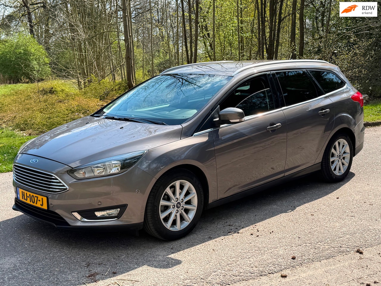 Ford Focus Wagon - 1.5 TDCI Titanium Edition ACC NAVI LEDER 2015 - AutoWereld.nl