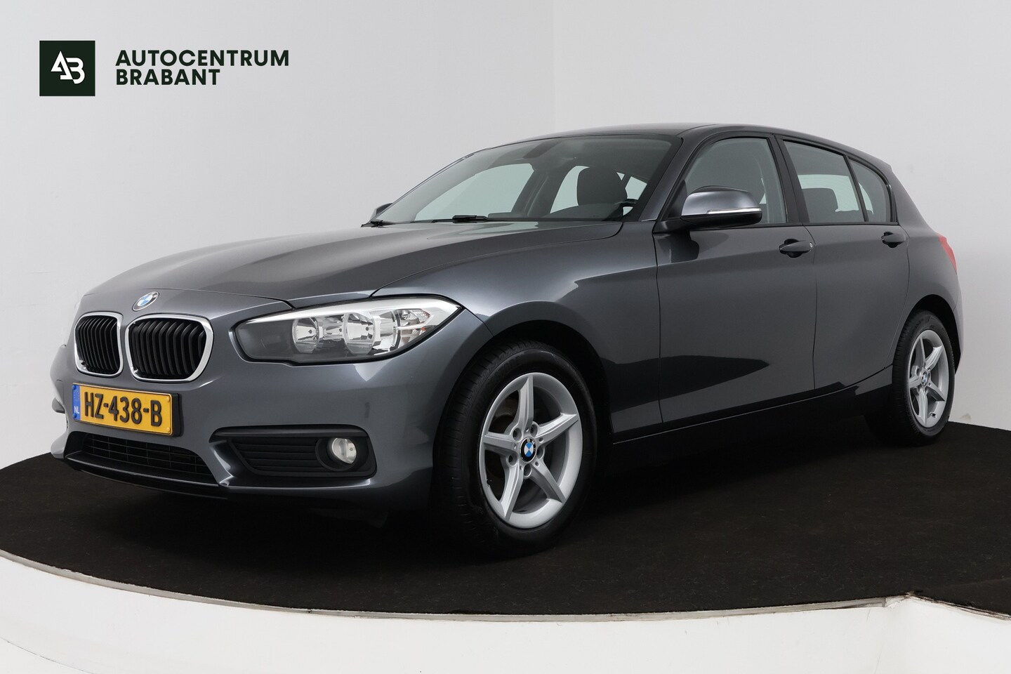 BMW 1-serie - 116i Essential (NAVIGATIE, CRUISE CONTROL, PARKEERSENSOREN) - AutoWereld.nl