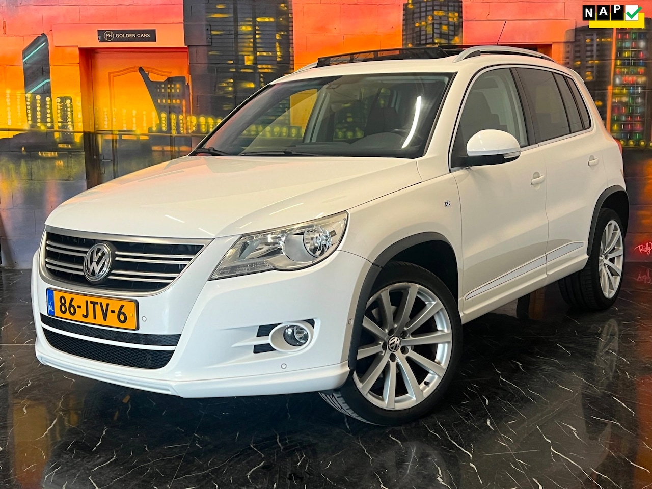 Volkswagen Tiguan - 1.4 TSI Sport&Style 4Motion Pano|Park.Sensor - AutoWereld.nl