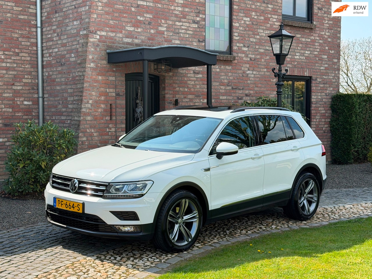Volkswagen Tiguan - 1.4 TSI Comfortline Panodak Navi Camera Led - AutoWereld.nl