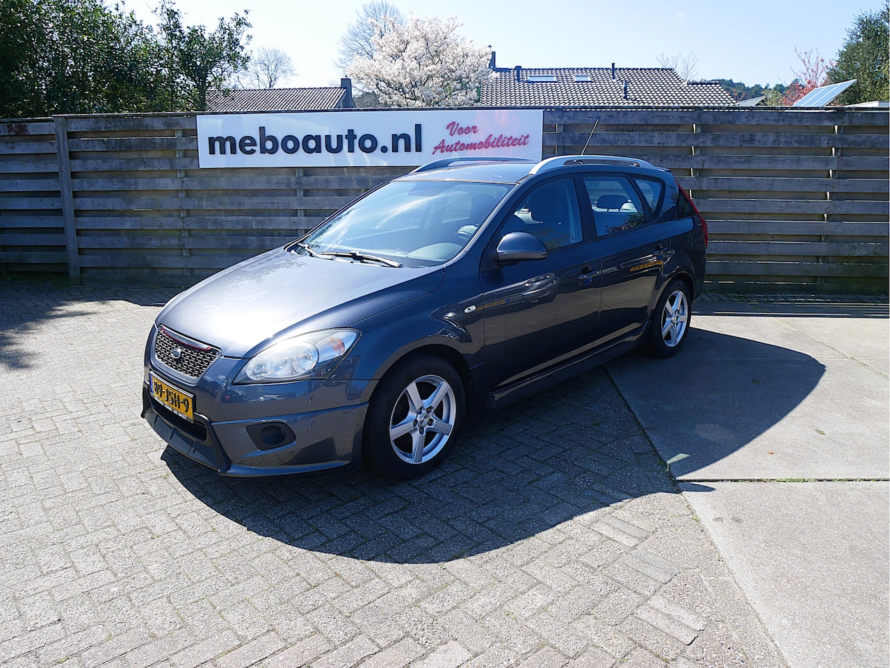 Kia Cee'd Sporty Wagon - 1.4 CVVT X-ecutive 1.4 CVVT X-ecutive - AutoWereld.nl