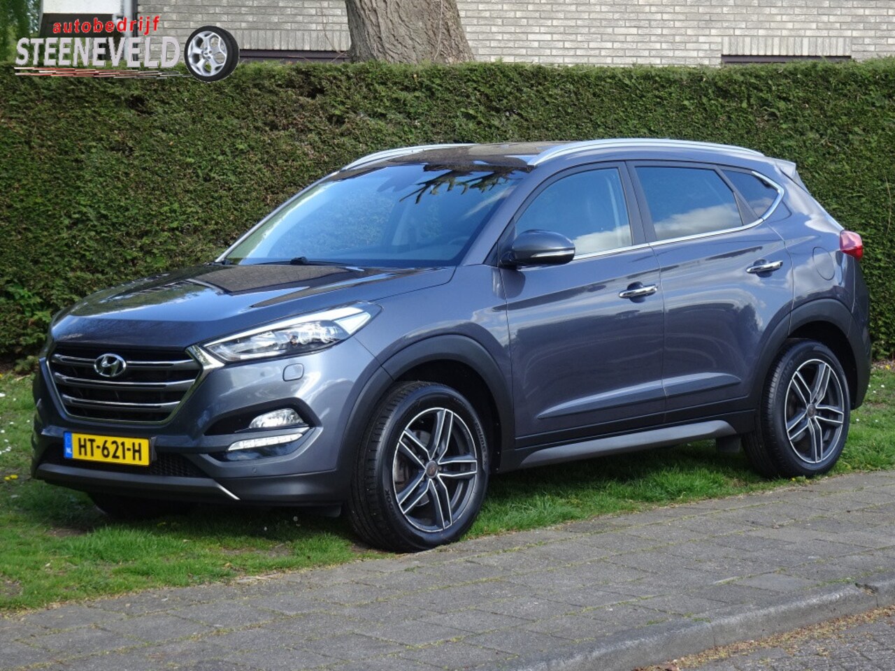 Hyundai Tucson - 1.6 GDi Premium met Navi, Camera en Stoelverkoeling - AutoWereld.nl