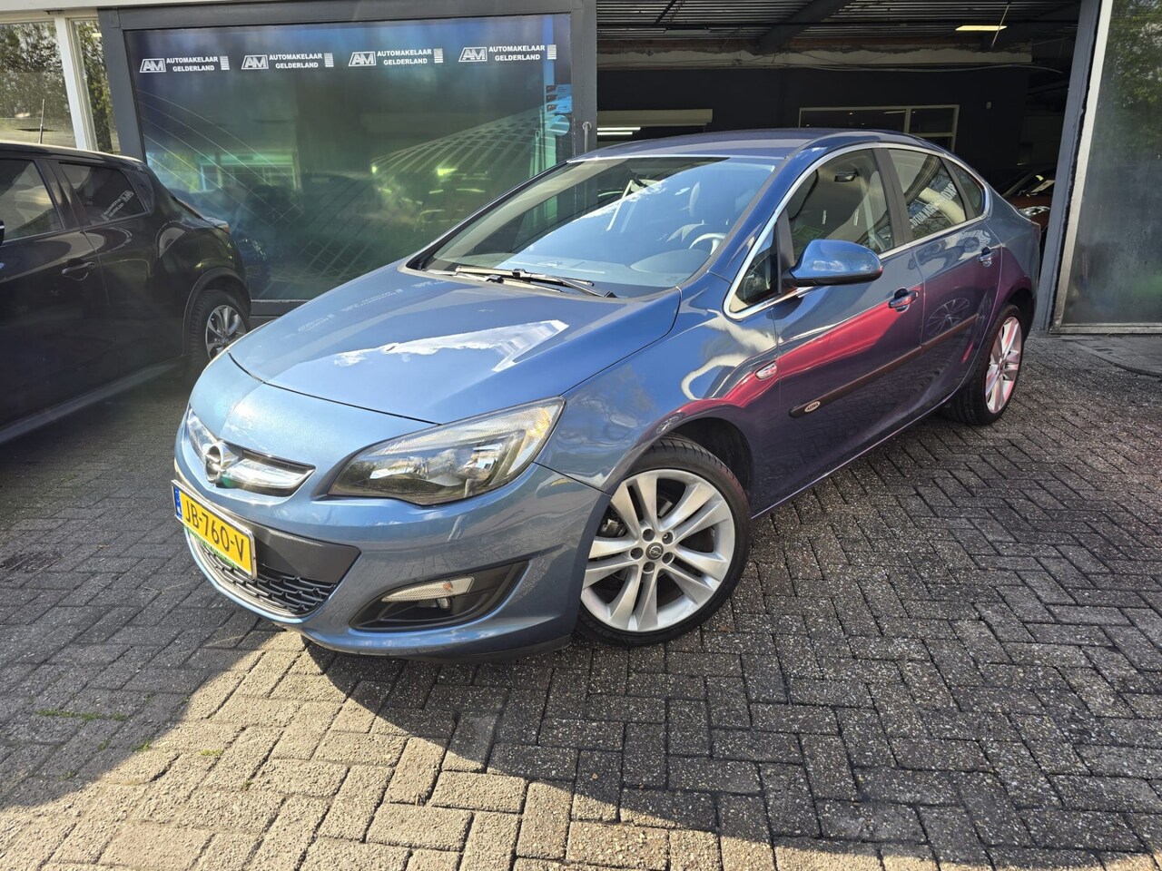 Opel Astra - 1.4 Turbo Edition | 2E EIGENAAR | 12MND GARANTIE | AUTOMAAT | NAVI | CRUISE | LMV | - AutoWereld.nl
