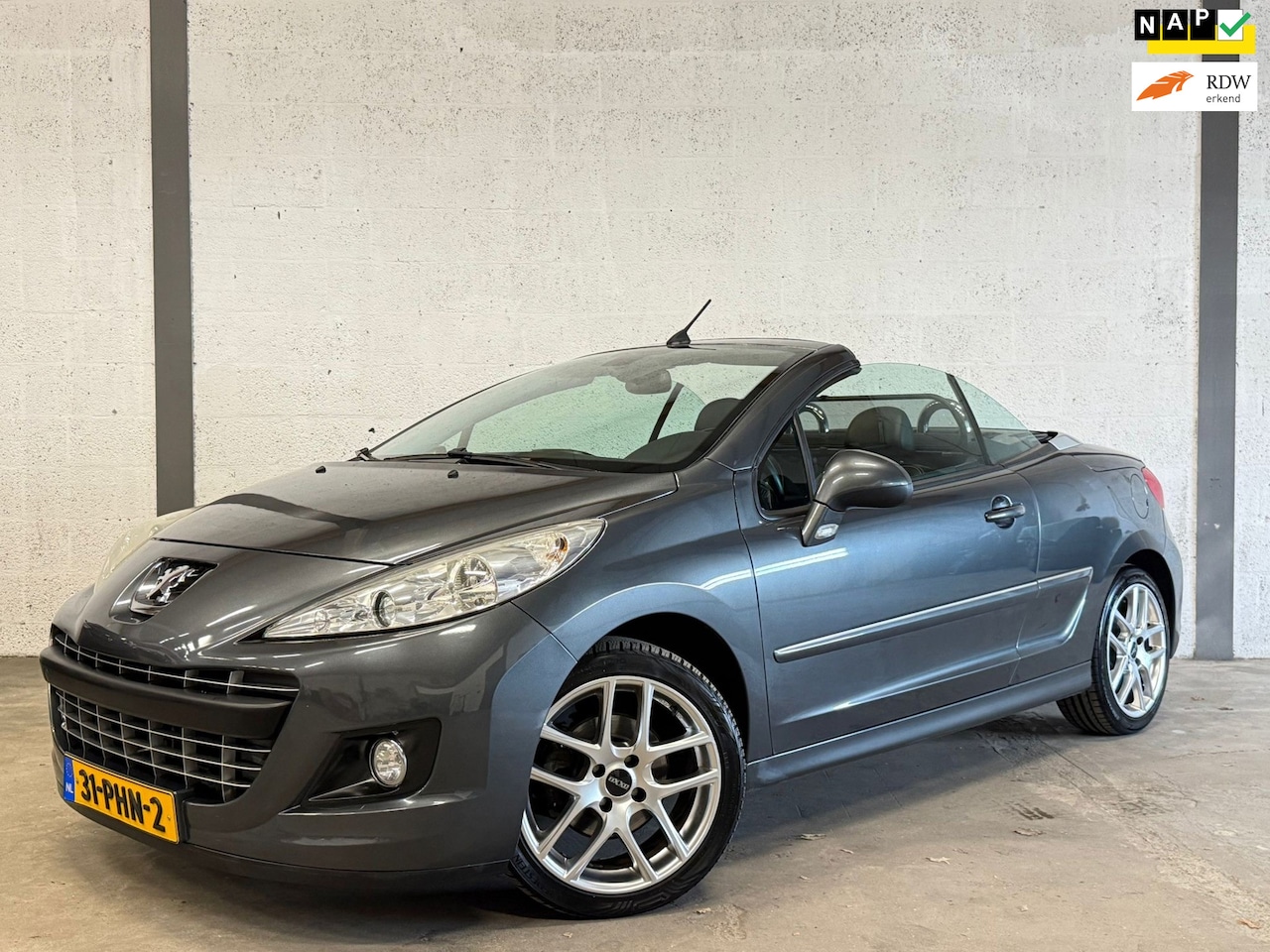 Peugeot 207 CC - 1.6 Sport 156PK Leder|Clima|Cruise|PDC|Apk 04/27 - AutoWereld.nl