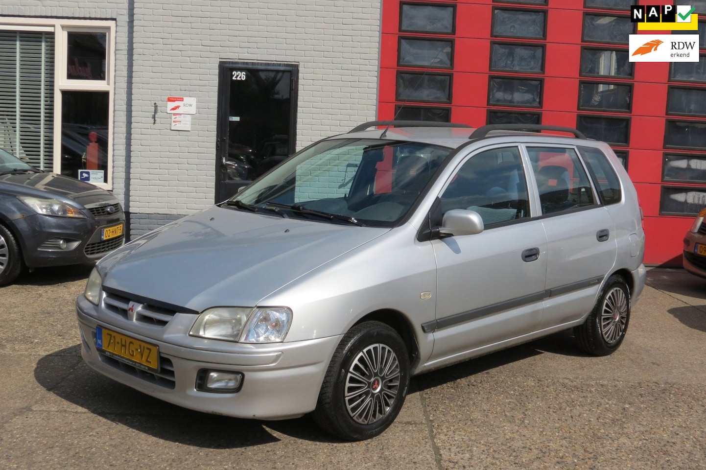 Mitsubishi Space Star - 1.6 AIRCO , TREKHAAK , NIEUWE APK - AutoWereld.nl