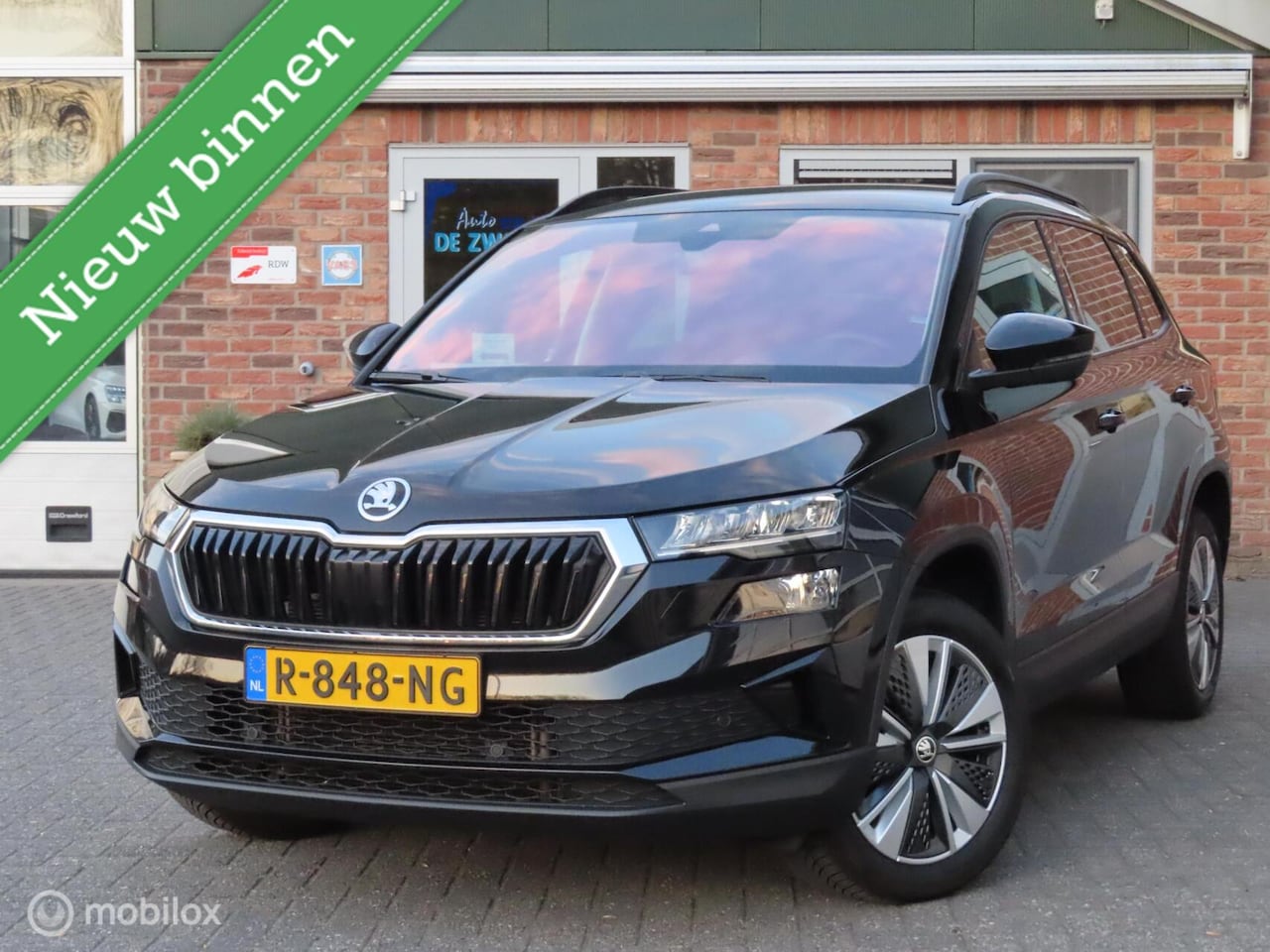 Skoda Karoq - 1.5 TSI ACT Sportline Business|Facelift|Camera|Stoelverwarming|El achterklep|Carplay. - AutoWereld.nl