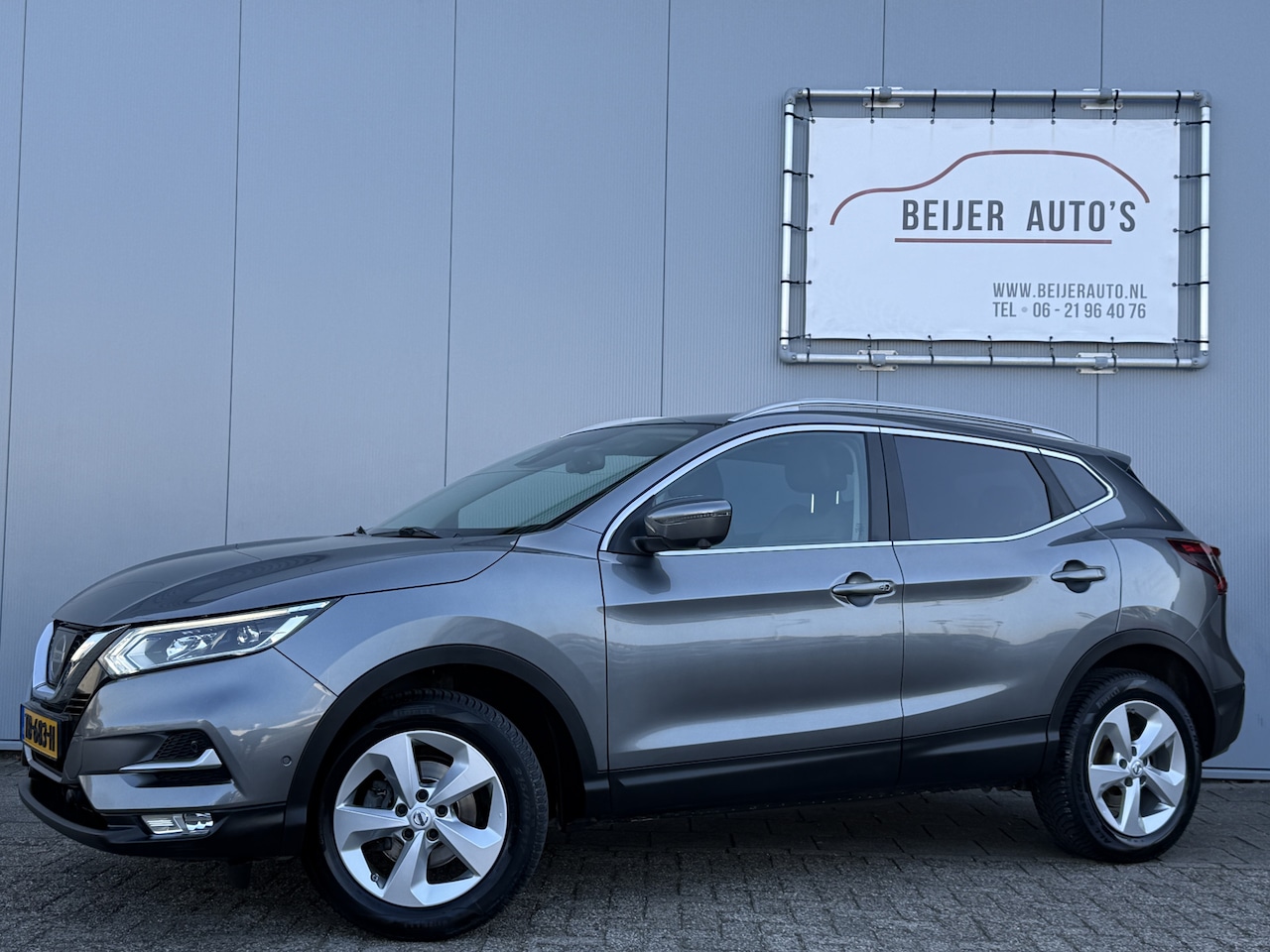 Nissan Qashqai - 1.2 Tekna + Panoramadak/Camera/17inch. - AutoWereld.nl