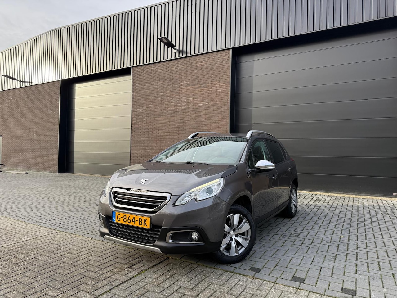 Peugeot 2008 - 1.2 80 PK Allure | 12MND GARANTIE | LAGE KM STAND | CRUISE | LMV | NW DISTR RIEM | - AutoWereld.nl