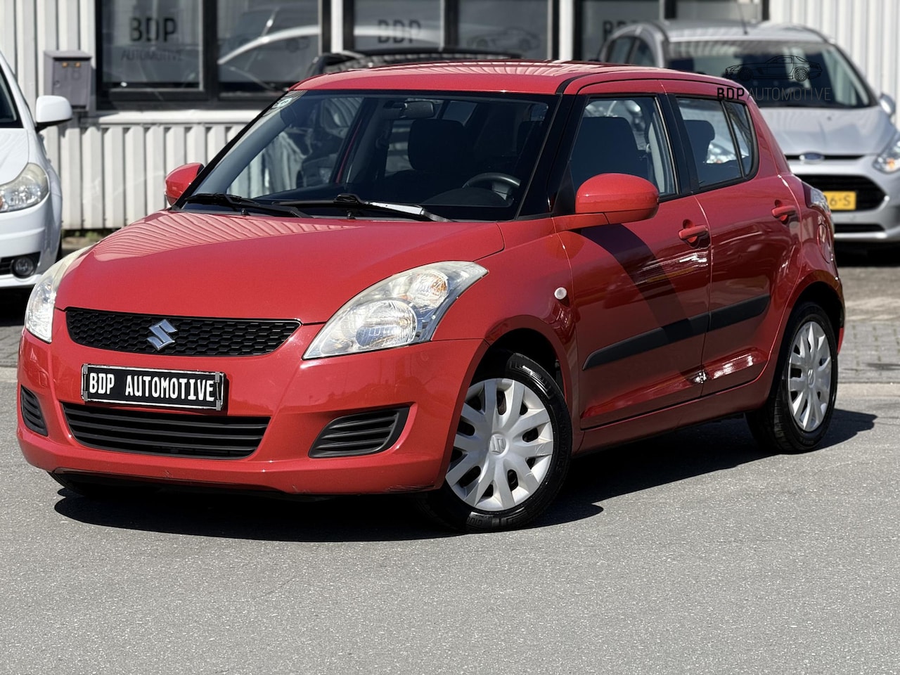 Suzuki Swift - 1.2 Comfort EASSS NL Auto | Airco | Stoelverwarming | Scherpe prijs! - AutoWereld.nl