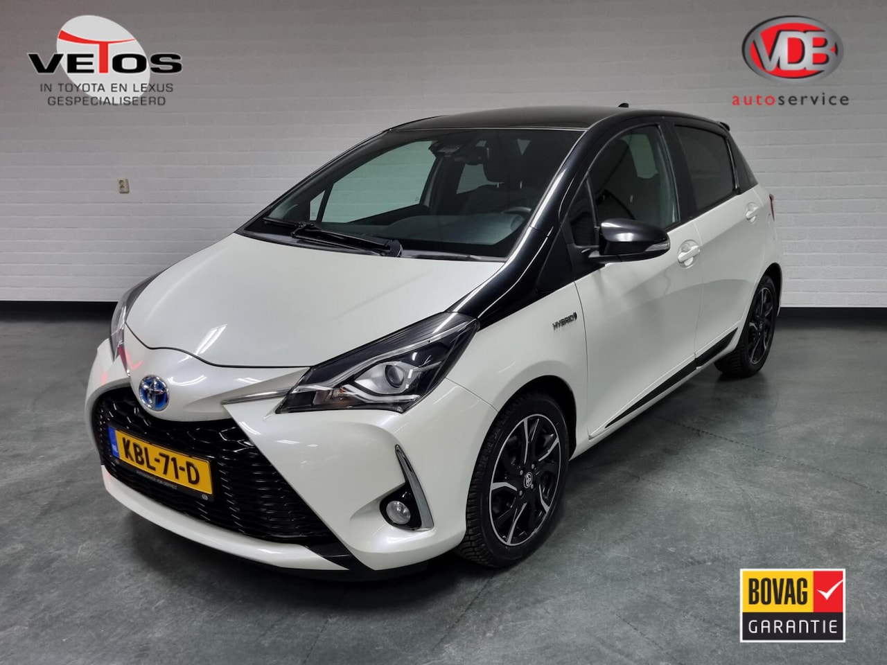 Toyota Yaris - 1.5 Hybrid Style Bi-Tone / Pano - AutoWereld.nl