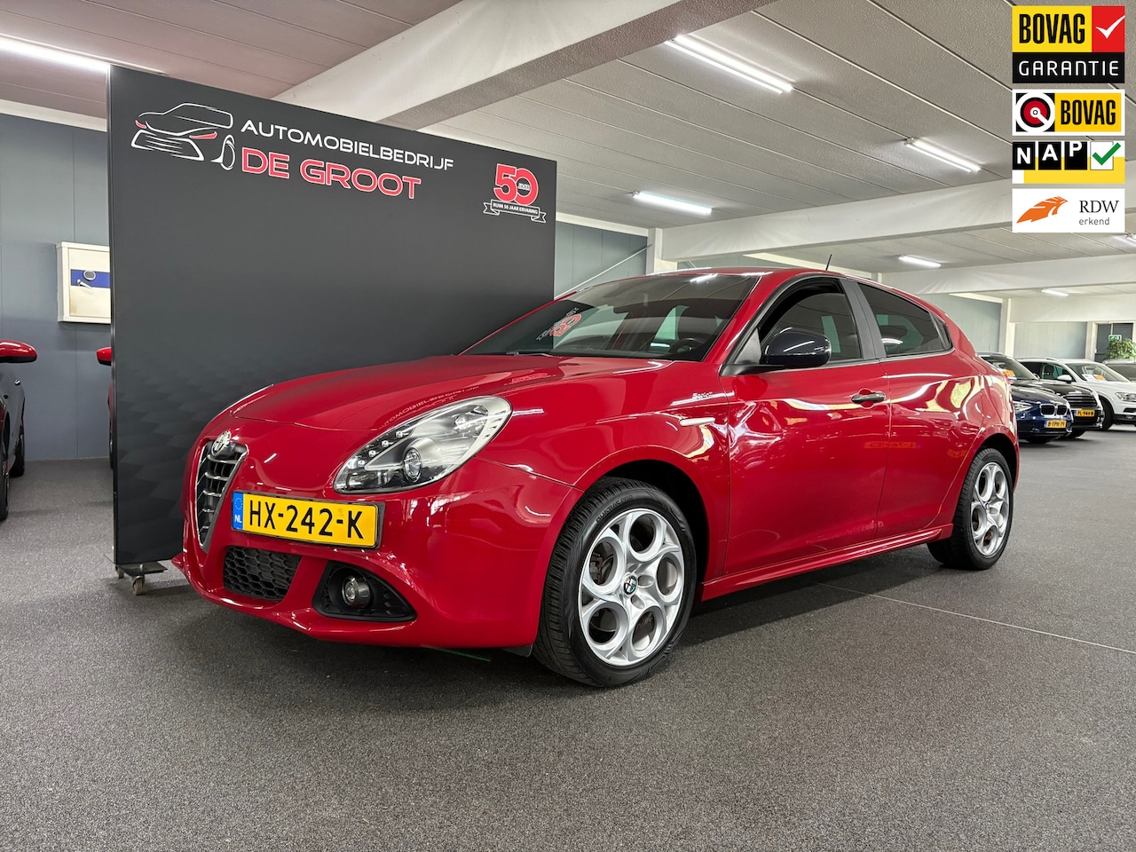Alfa Romeo Giulietta - 1.4 T Sprint/ NL auto/ Automaat/ LMV/ Parkeersensoren achter - AutoWereld.nl