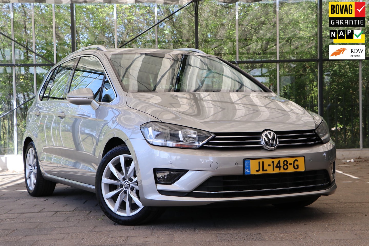 Volkswagen Golf Sportsvan - 1.4 TSI Highline / Trekhaak / Navi / PDC + camera / 1ste eigenaar / All-in prijs! / 12mnd - AutoWereld.nl