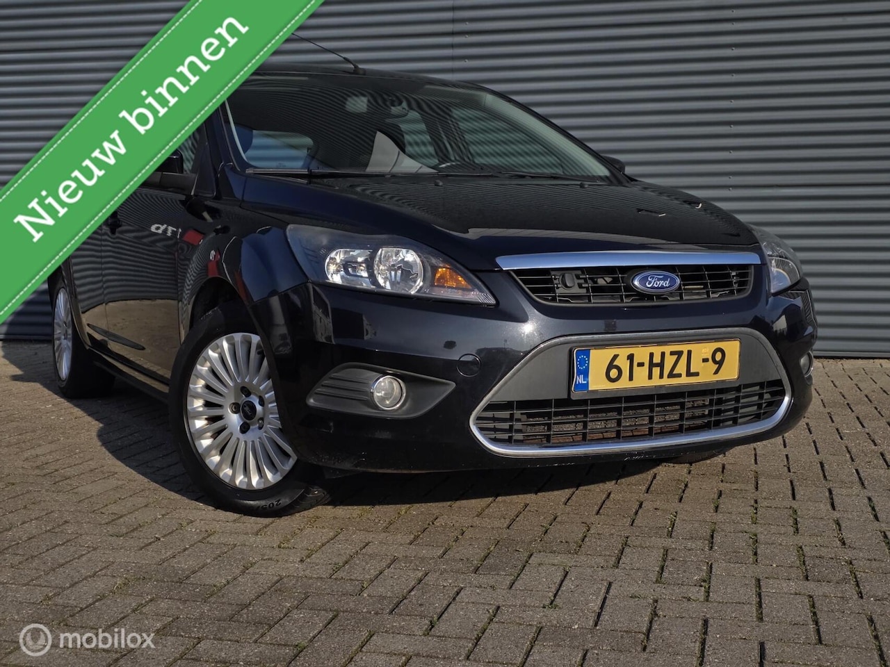 Ford Focus - 1.8 Titanium Flexi Fuel TREKHAAK/5DEURS/AIRCO - AutoWereld.nl