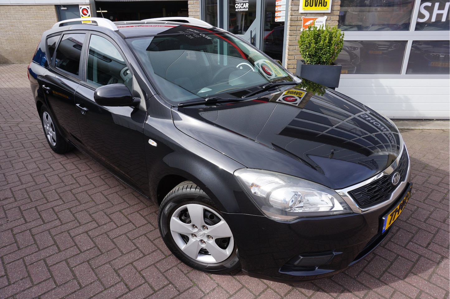 Kia Cee'd Sporty Wagon - 1.4 CVVT X-tra 1.4 CVVT X-tra - AutoWereld.nl