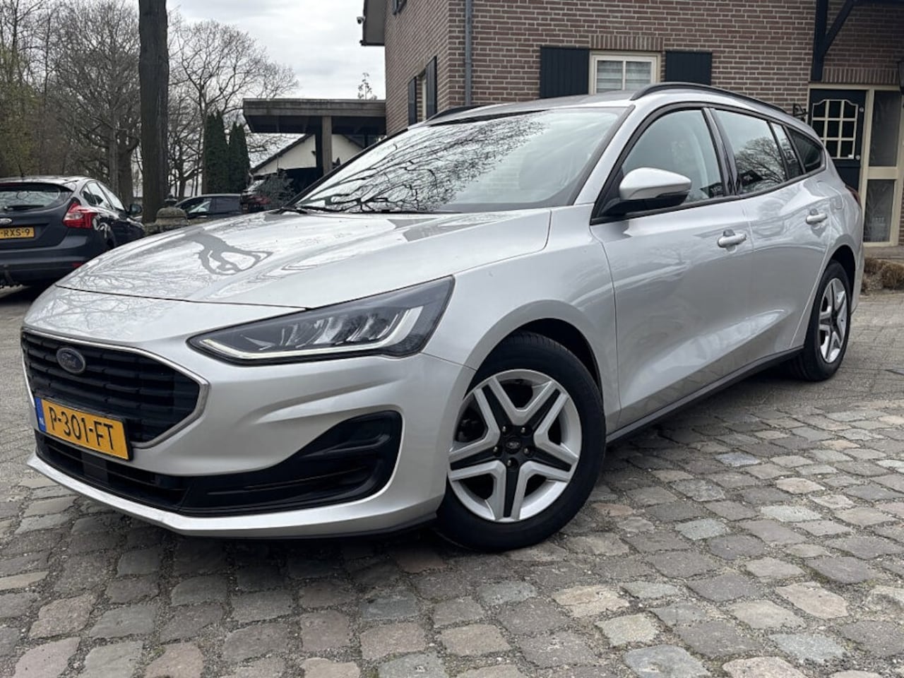 Ford Focus Wagon - 1.0 125pk Hybrid connect ,navigatie,lmv,sportdop,led,winter - AutoWereld.nl