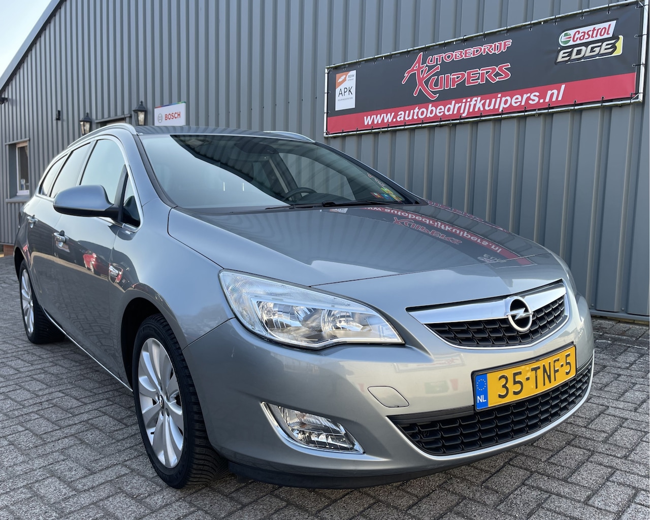 Opel Astra Sports Tourer - 1.4 Turbo Cosmo Airco.Cruise.Lm.velgen.Audio.1e Eign - AutoWereld.nl