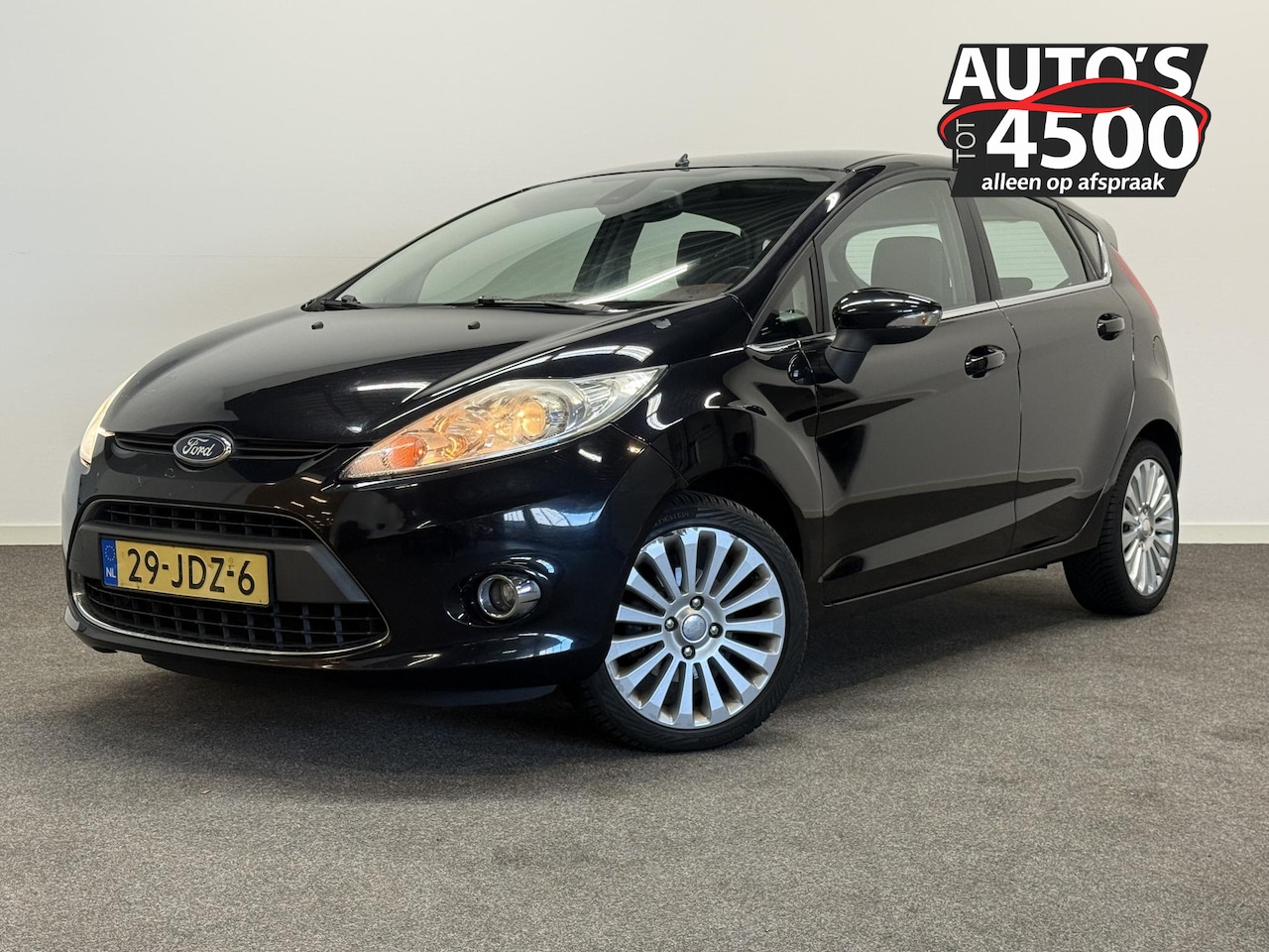 Ford Fiesta - 1.4 Titanium Clima! - AutoWereld.nl