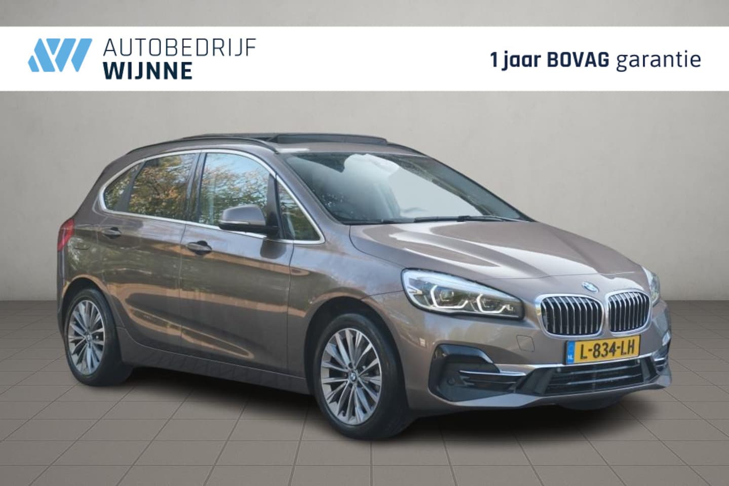 BMW 2-serie Active Tourer - 225xe iPerformance High Executive | SOH 87% | Navi | App Connect | Panoramadak | Keyless | - AutoWereld.nl