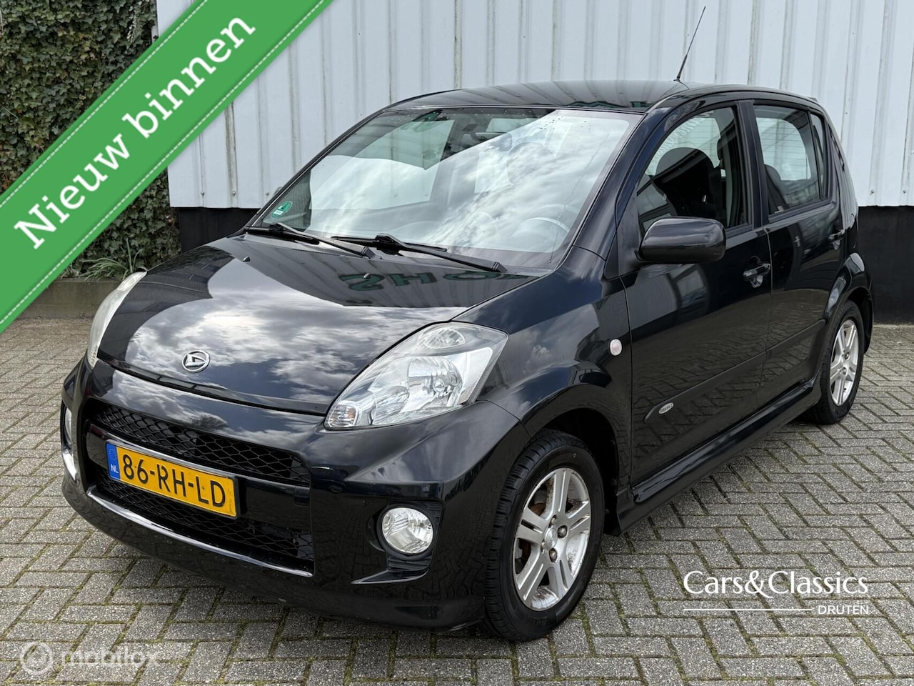 Daihatsu Sirion 2 - 1.3-16V Comfort Airco, Sportpakket, 5 Drs - AutoWereld.nl