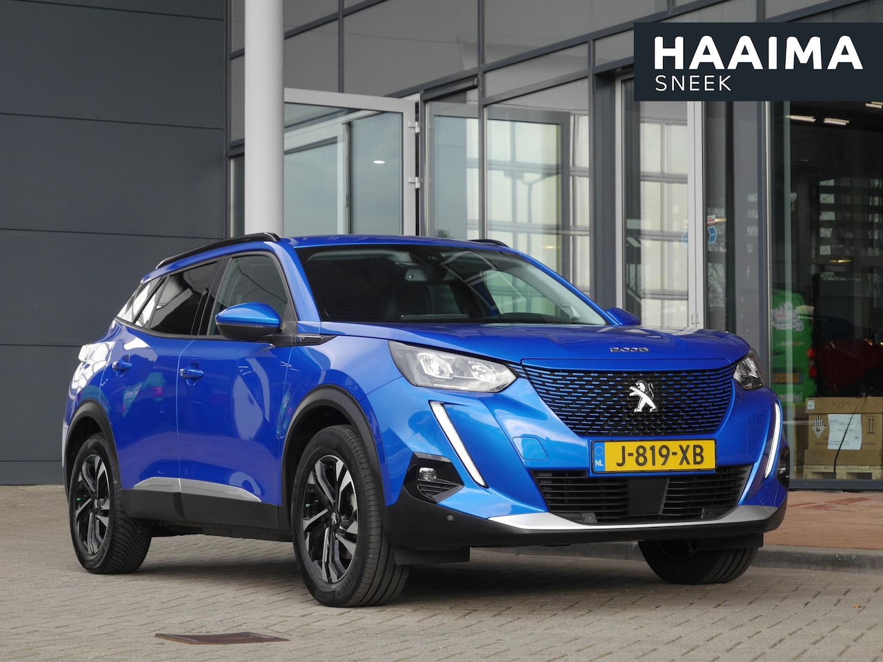Peugeot e-2008 - EV Allure 50 kWh | 3 Fase | Adaptieve cruise control | Draadloze telefoonlader | Stoelverw - AutoWereld.nl
