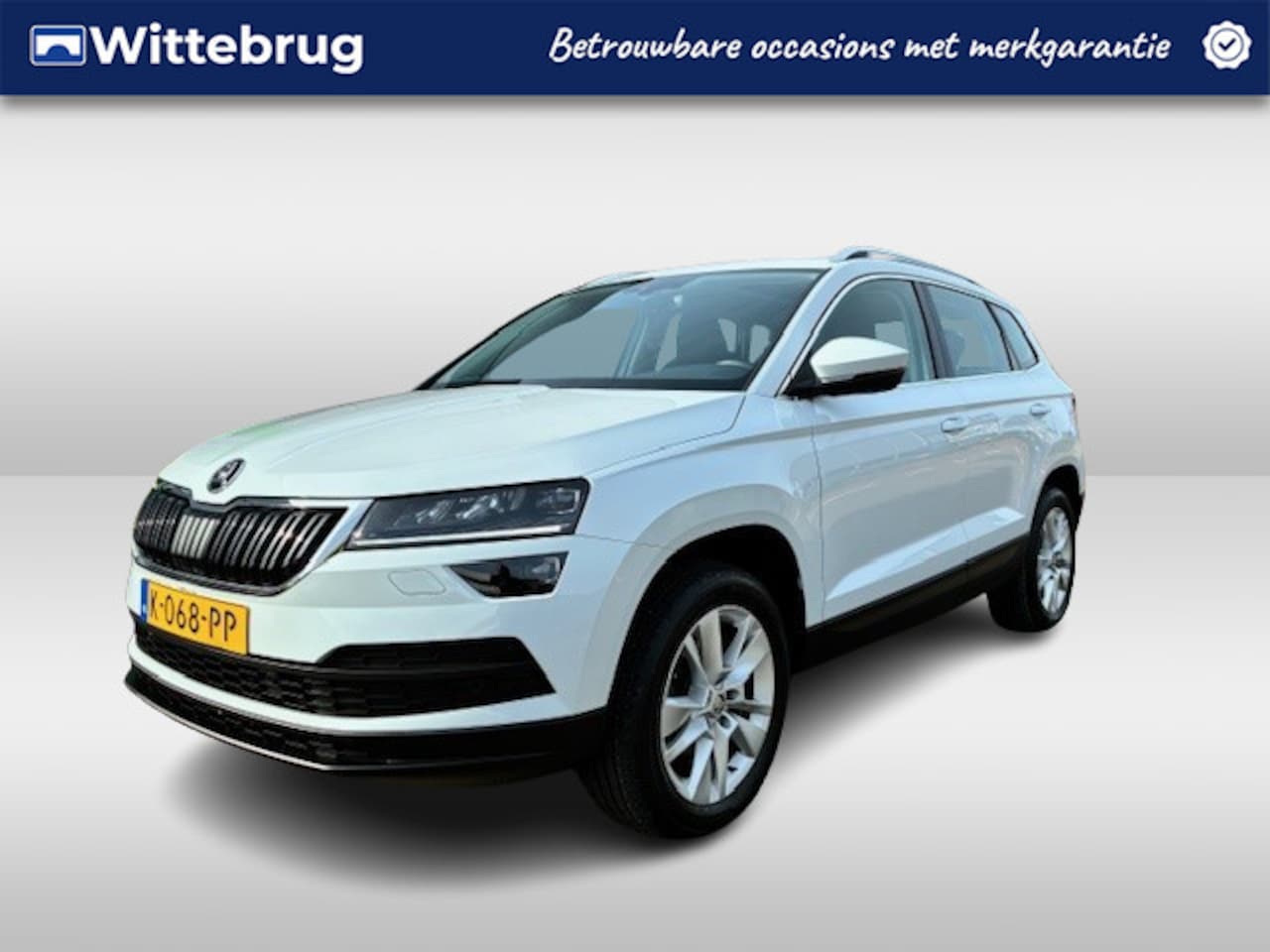Skoda Karoq - 1.5 TSI ACT 150pk DSG Business Edition Plus / Panoramadak / LED / Navi / Camera / Cruise C - AutoWereld.nl