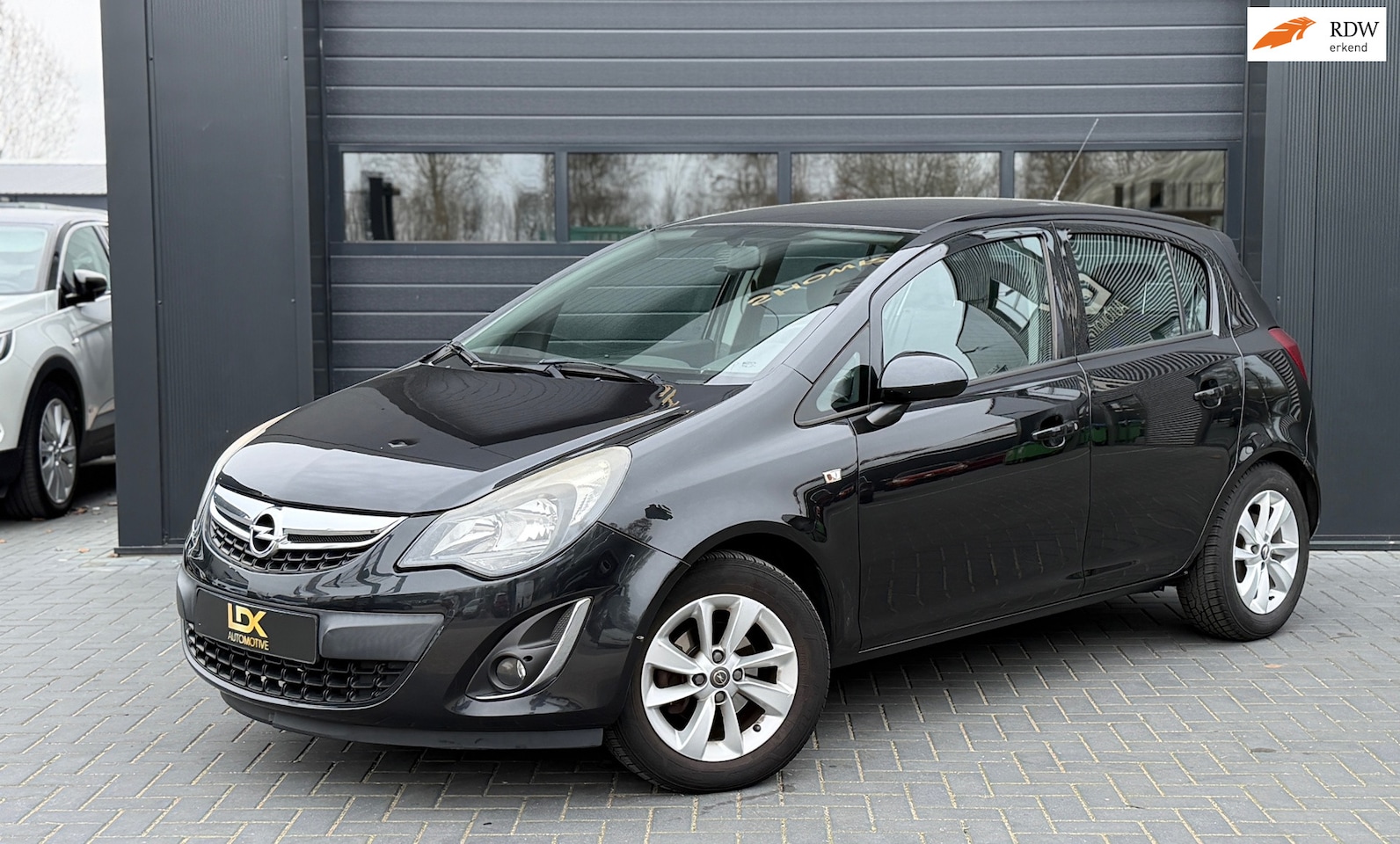 Opel Corsa - 1.2-16V Design Edition Airco|LM velgen|Nieuwe Ketting - AutoWereld.nl