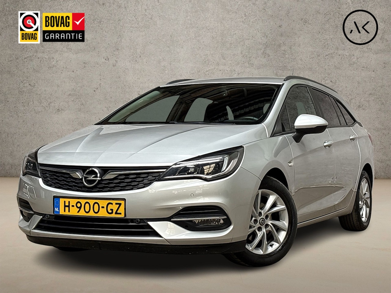 Opel Astra Sports Tourer - 1.4 Sport 146Pk Automaat (APPLE CARPLAY, NAVIGATIE, CAMERA, CLIMATE, GETINT GLAS, SPORTSTO - AutoWereld.nl