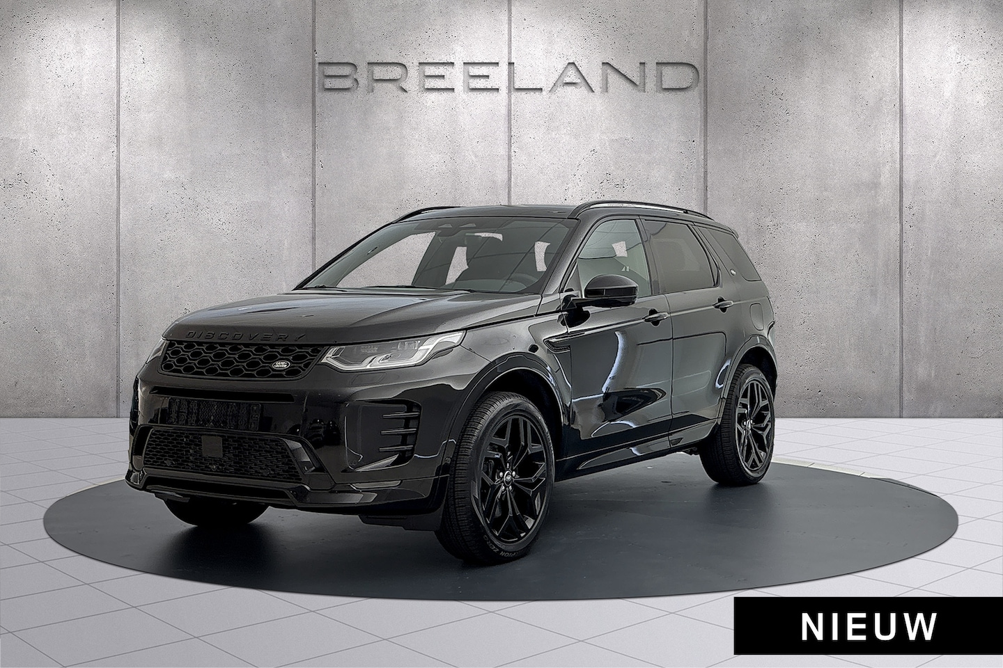 Land Rover Discovery Sport - P270e Business PHEV AWD Landmark Edition | Panoramadak | Trekhaak Santorini Black / Ebony - AutoWereld.nl