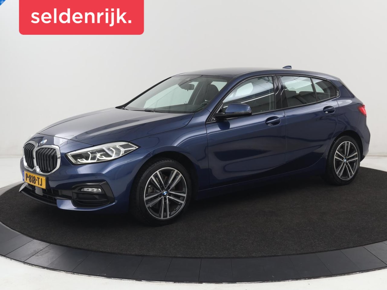 BMW 1-serie - 118i Sport Line | Sportstoelen | Carplay | Half leder | Live Cockpit | Full LED | Navigati - AutoWereld.nl