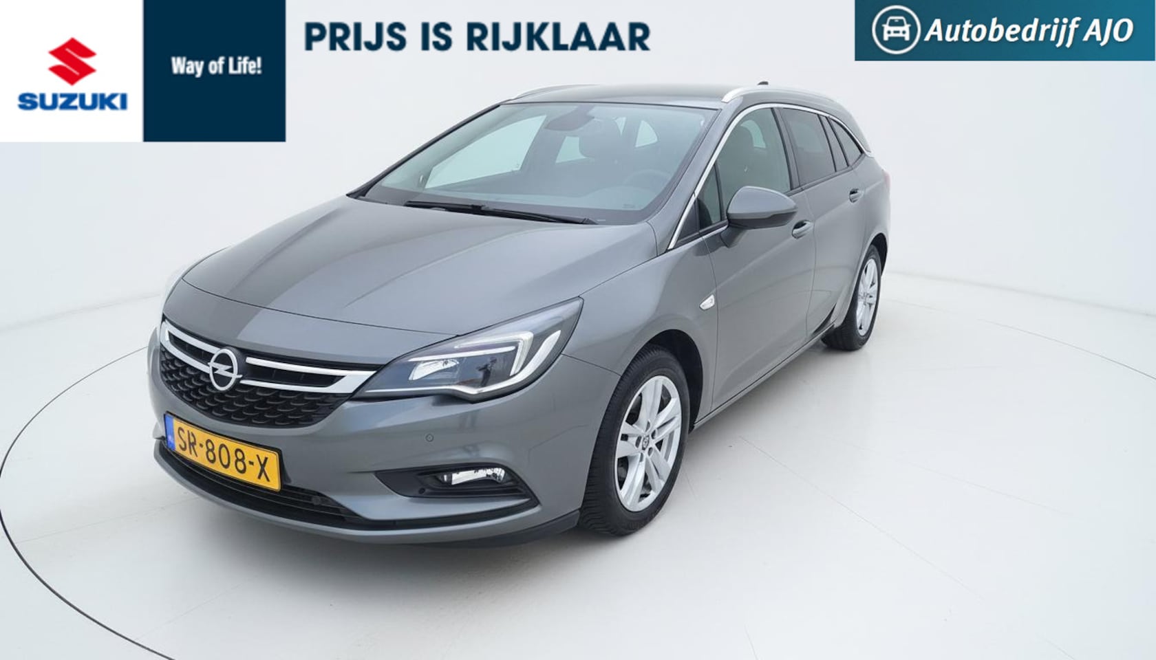 Opel Astra Sports Tourer - 1.4 Online Edition rijklaar prijs - AutoWereld.nl