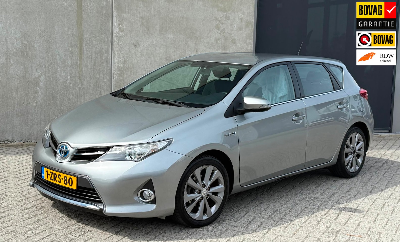 Toyota Auris - 1.8 Hybrid Aspiration GRIJS 2014 NAP|TREKHAAK - AutoWereld.nl