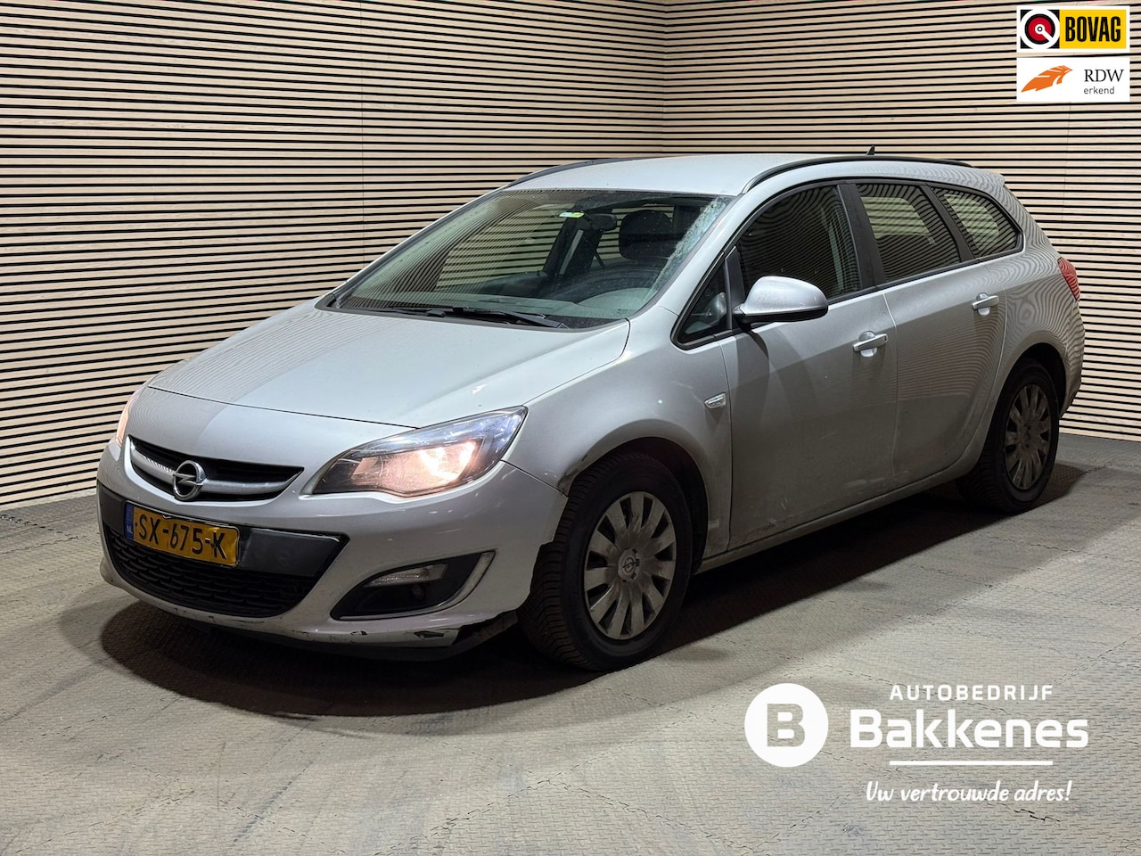 Opel Astra Sports Tourer - 1.7 CDTi Edition | Airco | Cruise | Navi - AutoWereld.nl