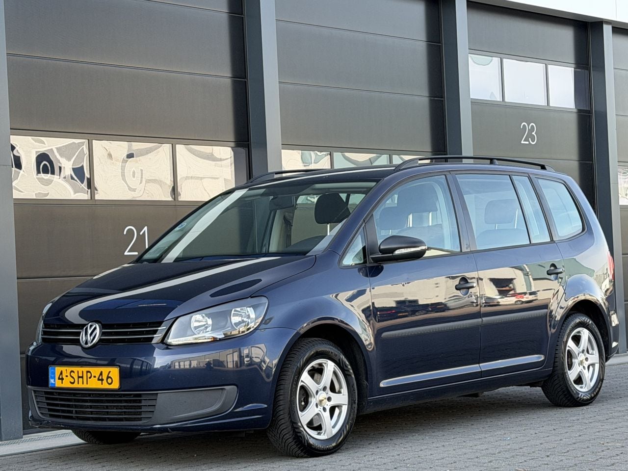 Volkswagen Touran - 1.6 TDI BlueMotion Navi Clima PDC - AutoWereld.nl