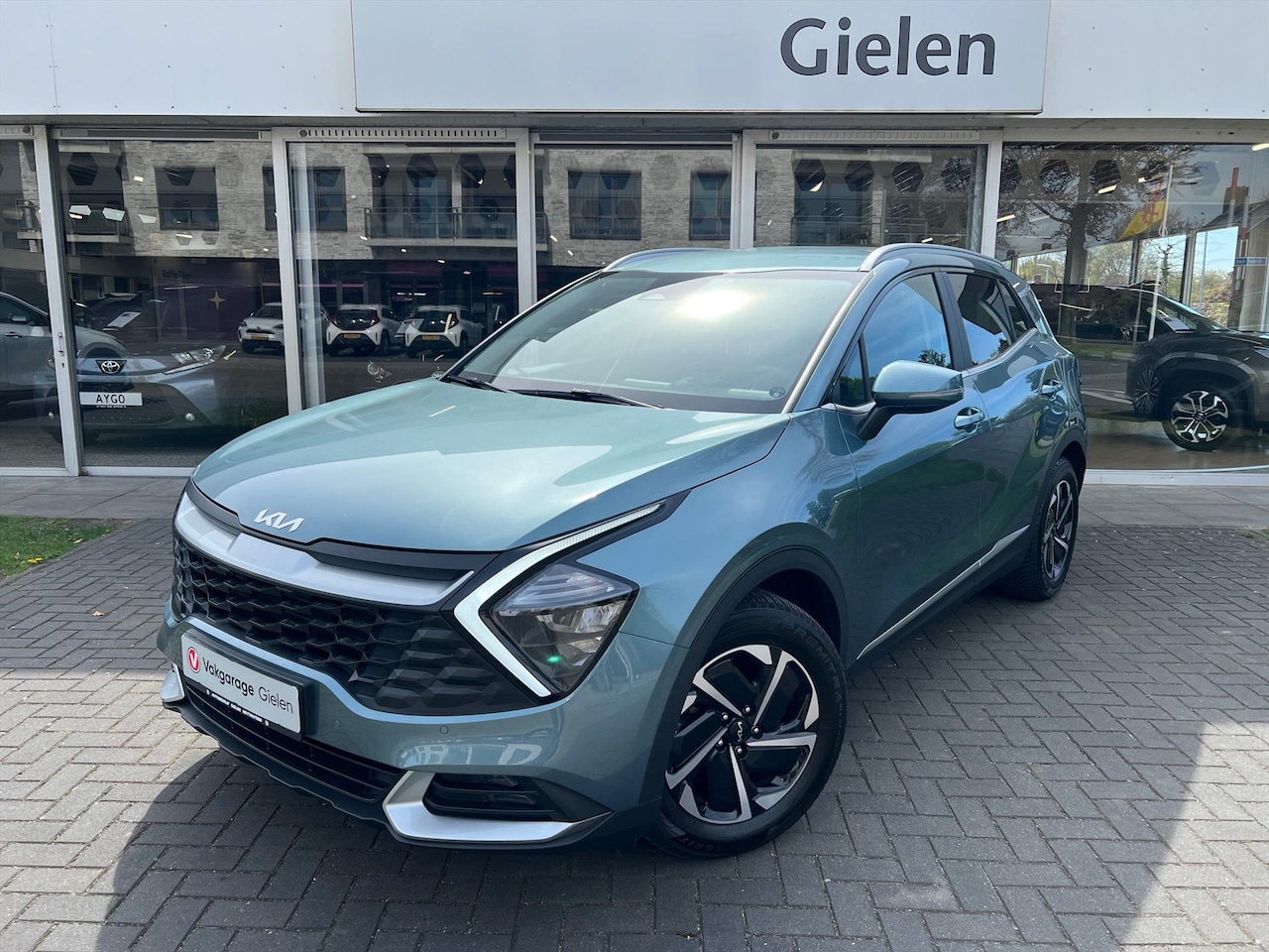Kia Sportage - 1.6 T-GDi MHEV 150PK DynamicLine Automaat | Stoel + Stuurverwarming, Parkeersensoren, Appl - AutoWereld.nl