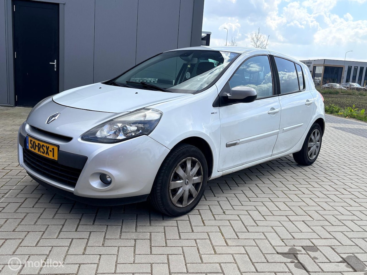 Renault Clio - 1.5 dCi Night & Day Airco Nav Clima Pdc Cruise - AutoWereld.nl