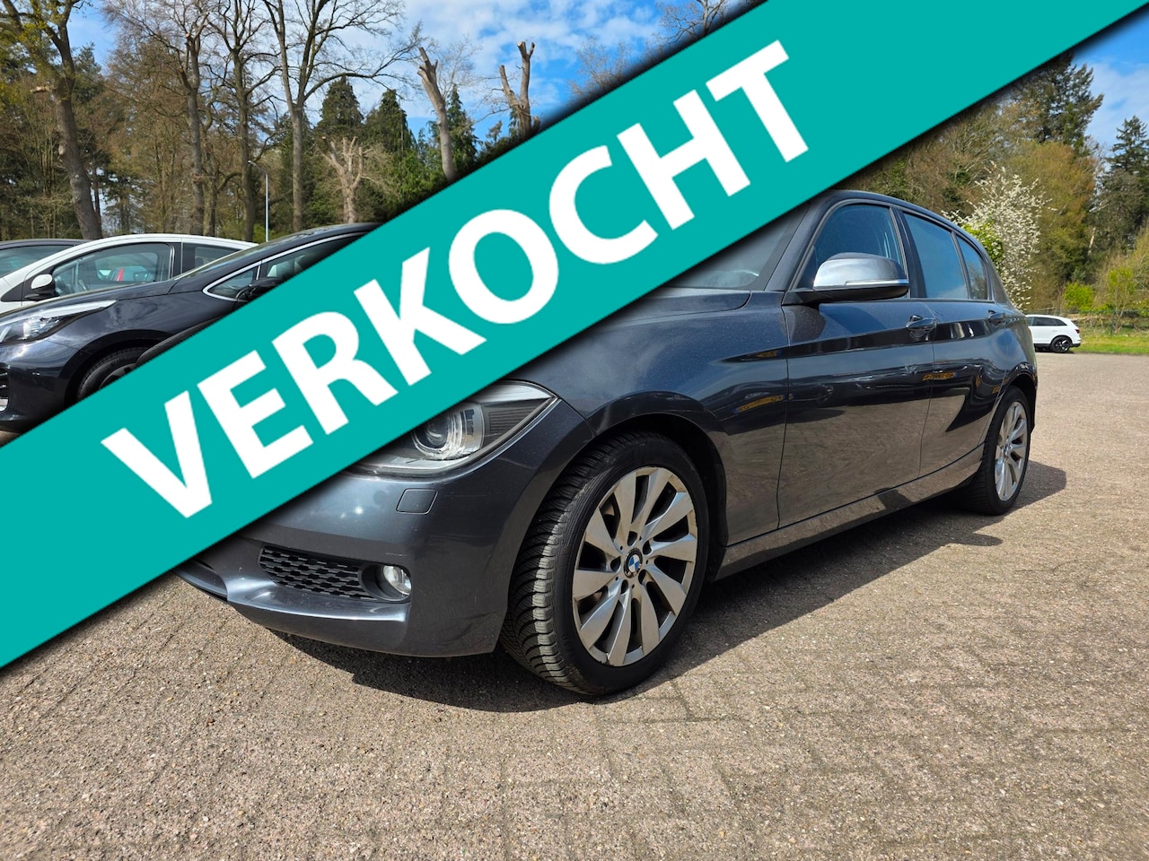BMW 1-serie - 118i Business+ AUTOMAAT/navi/CRUISE - AutoWereld.nl