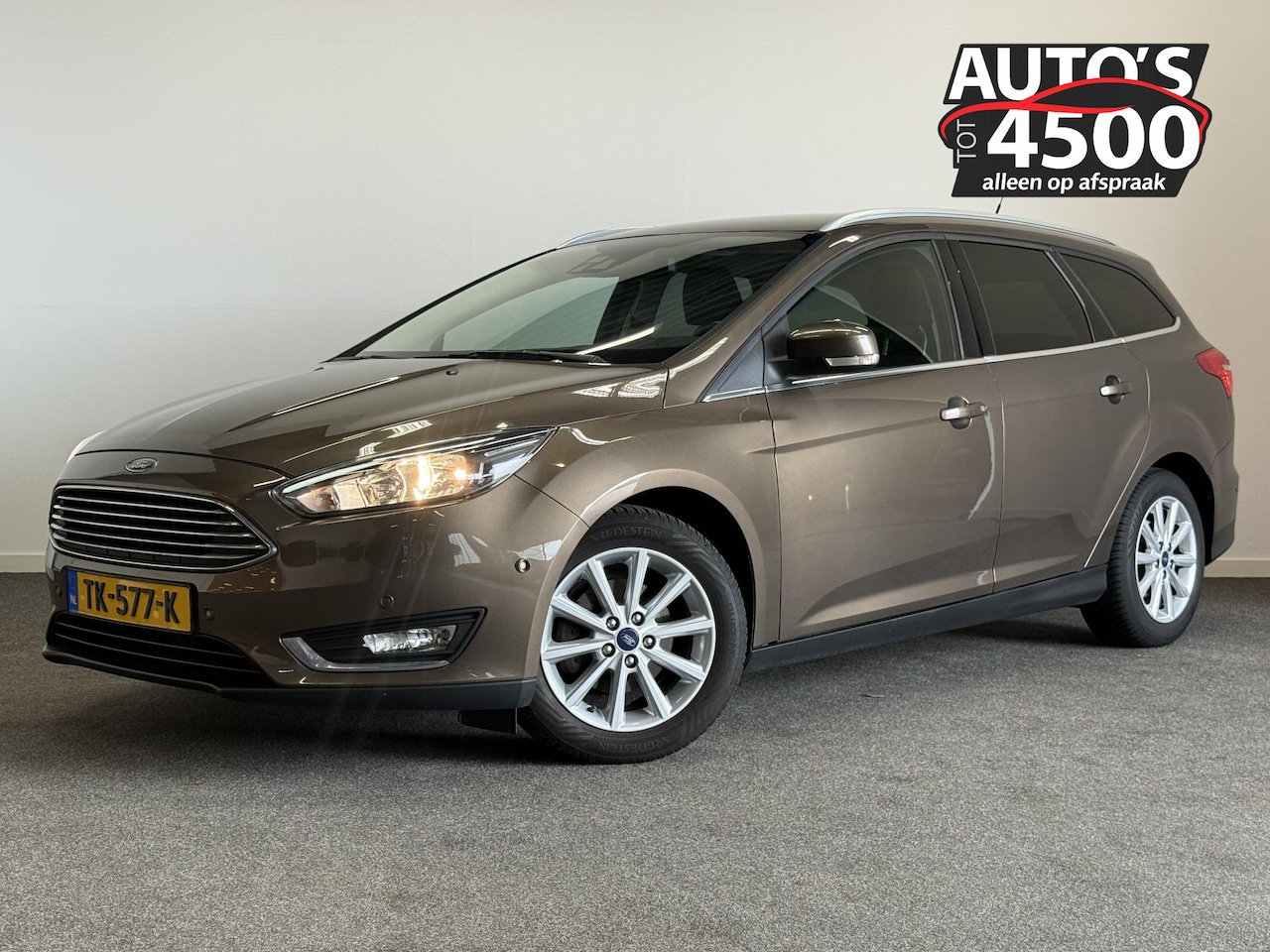 Ford Focus Wagon - 1.0 Titanium navigatie! Stoelverwarming! Zeer luxe - AutoWereld.nl
